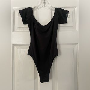 Black body suit with snaps
